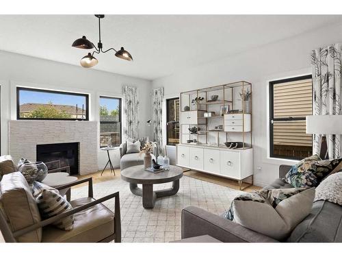 4628 Quentin Street Sw, Calgary, AB - Indoor Photo Showing Living Room With Fireplace