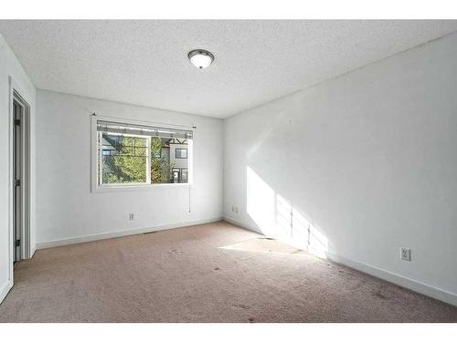 60 Rockyspring Grove Nw, Calgary, AB - Indoor Photo Showing Other Room