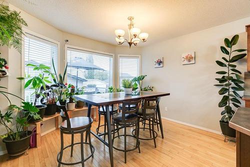 180 Silverado Way Sw, Calgary, AB - Indoor Photo Showing Dining Room