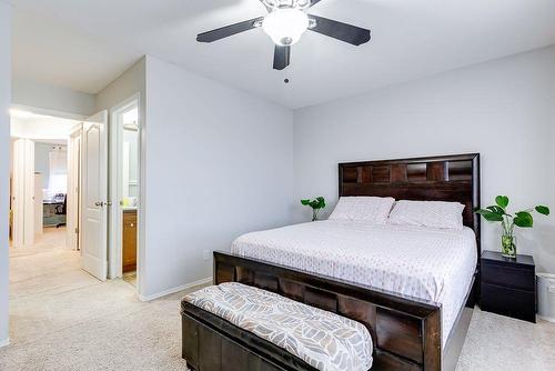 180 Silverado Way Sw, Calgary, AB - Indoor Photo Showing Bedroom