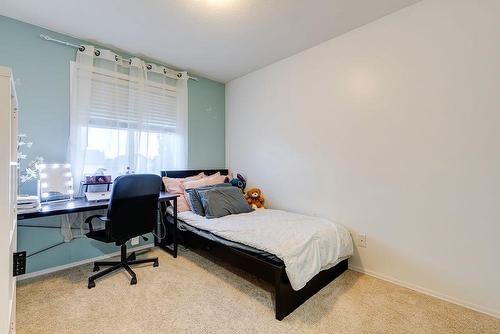 180 Silverado Way Sw, Calgary, AB - Indoor Photo Showing Bedroom