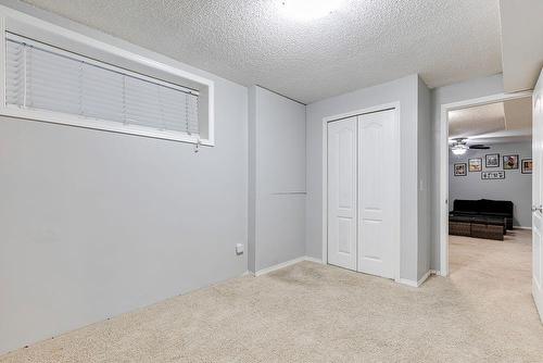 180 Silverado Way Sw, Calgary, AB - Indoor Photo Showing Other Room