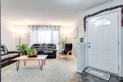 180 Silverado Way Sw, Calgary, AB - Indoor Photo Showing Living Room