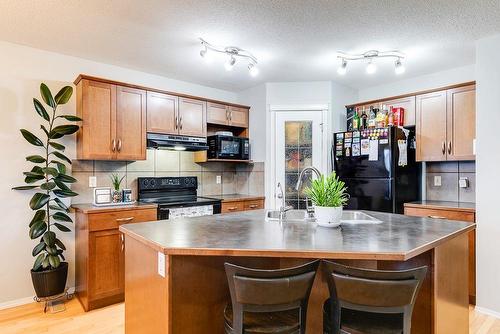 180 Silverado Way Sw, Calgary, AB - Indoor Photo Showing Kitchen