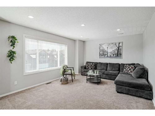 18 Chaparral Valley Place Se, Calgary, AB - Indoor Photo Showing Living Room