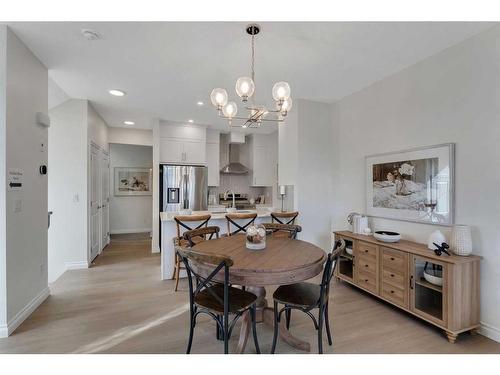 1015 Bayview Crescent Sw, Airdrie, AB - Indoor Photo Showing Dining Room