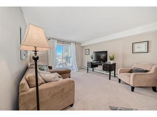 1312-2518 Fish Creek Boulevard Sw, Calgary, AB - Indoor Photo Showing Living Room