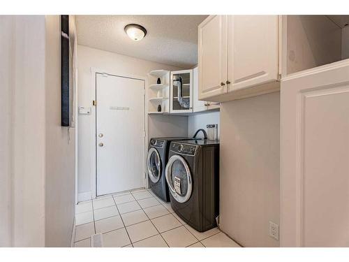 230 Arbour Ridge Park Nw, Calgary, AB - Indoor Photo Showing Laundry Room