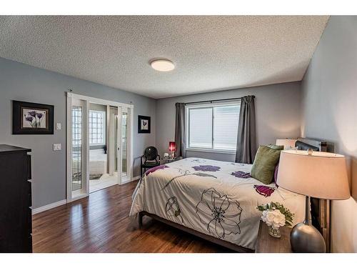 230 Arbour Ridge Park Nw, Calgary, AB - Indoor Photo Showing Bedroom