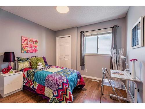 230 Arbour Ridge Park Nw, Calgary, AB - Indoor Photo Showing Bedroom