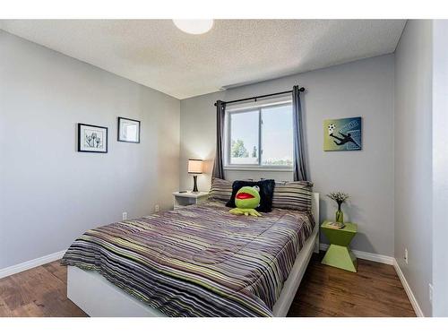 230 Arbour Ridge Park Nw, Calgary, AB - Indoor Photo Showing Bedroom