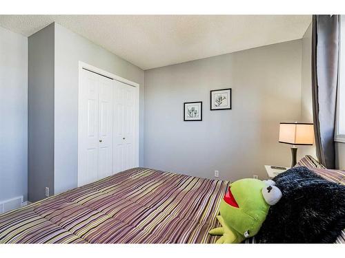 230 Arbour Ridge Park Nw, Calgary, AB - Indoor Photo Showing Bedroom