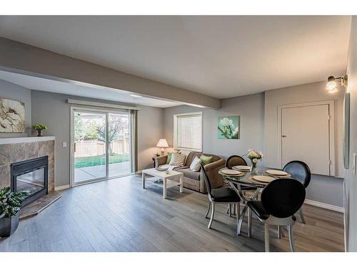 230 Arbour Ridge Park Nw, Calgary, AB - Indoor With Fireplace