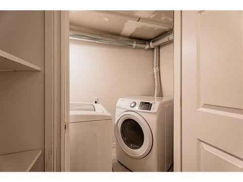 230 Arbour Ridge Park Nw, Calgary, AB - Indoor Photo Showing Laundry Room