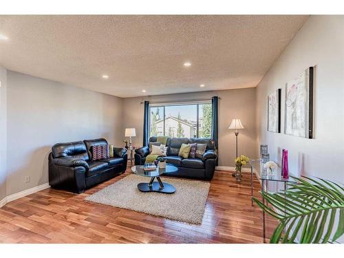 230 Arbour Ridge Park Nw, Calgary, AB - Indoor Photo Showing Living Room