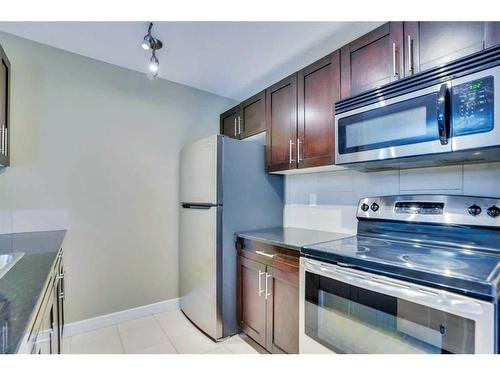 201-195 Kincora Glen Road Ne, Calgary, AB - Indoor Photo Showing Kitchen