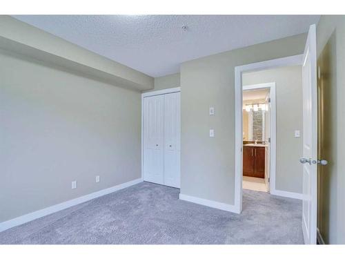 201-195 Kincora Glen Road Ne, Calgary, AB - Indoor Photo Showing Other Room