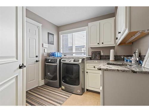 301 Lakeside Greens Crescent, Chestermere, AB - Indoor Photo Showing Laundry Room