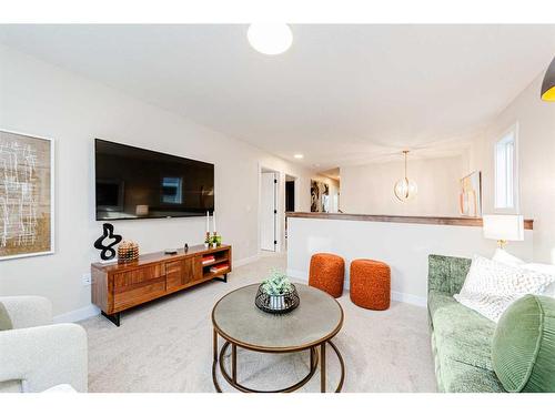 1407 Bayview Crescent Sw, Airdrie, AB - Indoor Photo Showing Living Room