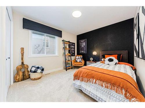 1407 Bayview Crescent Sw, Airdrie, AB - Indoor Photo Showing Bedroom