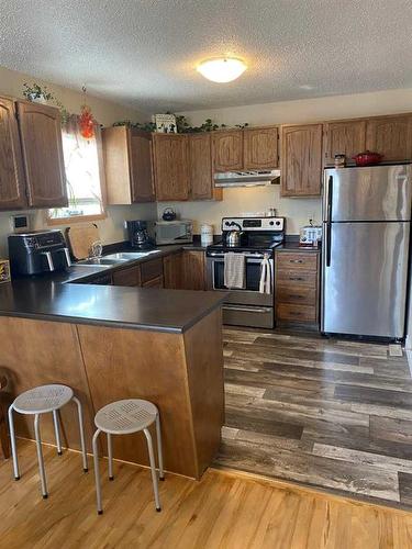 96 Barrett Drive, Red Deer, AB - Indoor Photo Showing Kitchen With Stainless Steel Kitchen