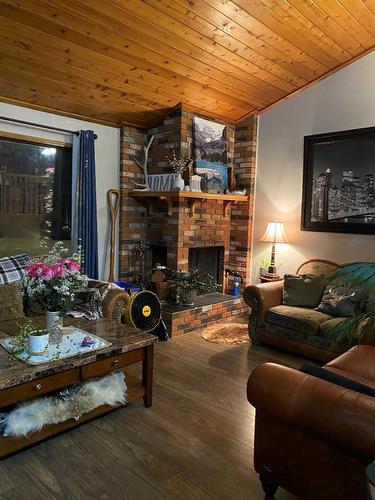 96 Barrett Drive, Red Deer, AB - Indoor Photo Showing Living Room With Fireplace