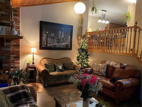 96 Barrett Drive, Red Deer, AB - Indoor Photo Showing Living Room With Fireplace