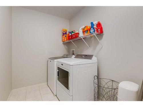 33 Sage Bluff Close Nw, Calgary, AB - Indoor Photo Showing Laundry Room