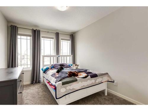 33 Sage Bluff Close Nw, Calgary, AB - Indoor Photo Showing Bedroom