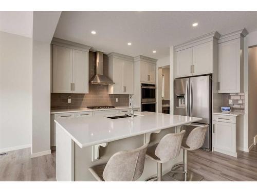 33 Sage Bluff Close Nw, Calgary, AB - Indoor Photo Showing Kitchen With Stainless Steel Kitchen With Double Sink With Upgraded Kitchen