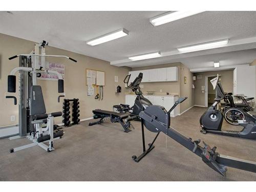 3323-3000 Millrise Point Sw, Calgary, AB - Indoor Photo Showing Gym Room