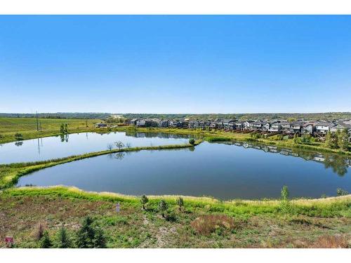 2409-42 Cranbrook Gardens Se, Calgary, AB - Outdoor With Body Of Water With View