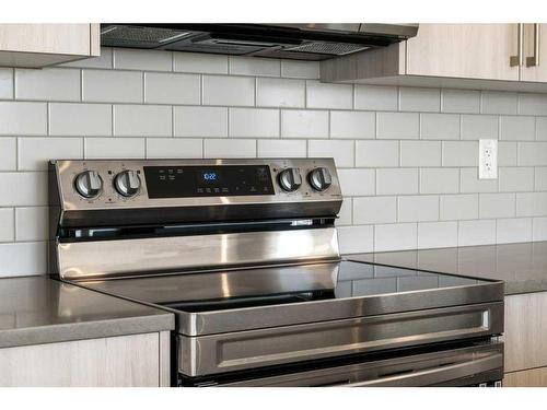 2409-42 Cranbrook Gardens Se, Calgary, AB - Indoor Photo Showing Kitchen