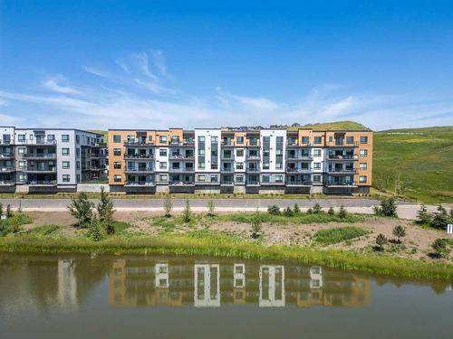 2409-42 Cranbrook Gardens Se, Calgary, AB - Outdoor With Body Of Water