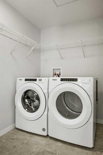 2409-42 Cranbrook Gardens Se, Calgary, AB - Indoor Photo Showing Laundry Room