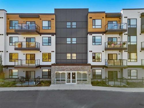 2409-42 Cranbrook Gardens Se, Calgary, AB - Outdoor With Balcony With Facade