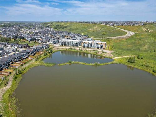 2409-42 Cranbrook Gardens Se, Calgary, AB - Outdoor With Body Of Water With View