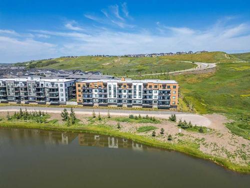 2409-42 Cranbrook Gardens Se, Calgary, AB - Outdoor With Body Of Water With View