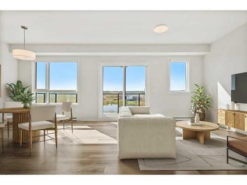 2409-42 Cranbrook Gardens Se, Calgary, AB - Indoor Photo Showing Living Room