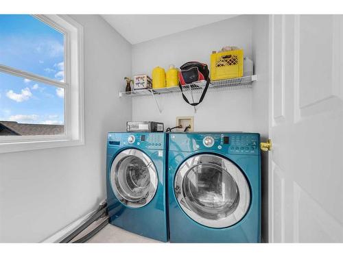 14 Taravista Gardens Ne, Calgary, AB - Indoor Photo Showing Laundry Room