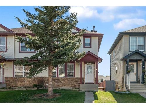 14 Taravista Gardens Ne, Calgary, AB - Outdoor With Facade