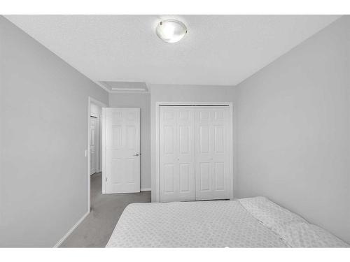 14 Taravista Gardens Ne, Calgary, AB - Indoor Photo Showing Bedroom