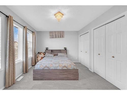 14 Taravista Gardens Ne, Calgary, AB - Indoor Photo Showing Bedroom