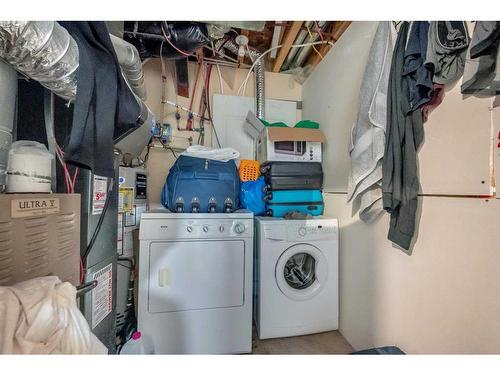 14 Taravista Gardens Ne, Calgary, AB - Indoor Photo Showing Laundry Room