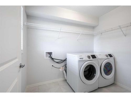 534 Harvest Grove Walk Ne, Calgary, AB - Indoor Photo Showing Laundry Room