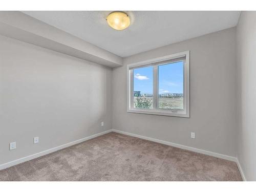 2306-450 Kincora Glen Road Nw, Calgary, AB - Indoor Photo Showing Other Room