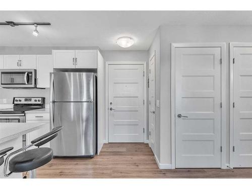 2306-450 Kincora Glen Road Nw, Calgary, AB - Indoor Photo Showing Kitchen With Stainless Steel Kitchen