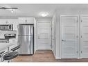 2306-450 Kincora Glen Road Nw, Calgary, AB  - Indoor Photo Showing Kitchen With Stainless Steel Kitchen 