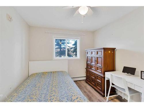 113-5000 Somervale Court Sw, Calgary, AB - Indoor Photo Showing Bedroom