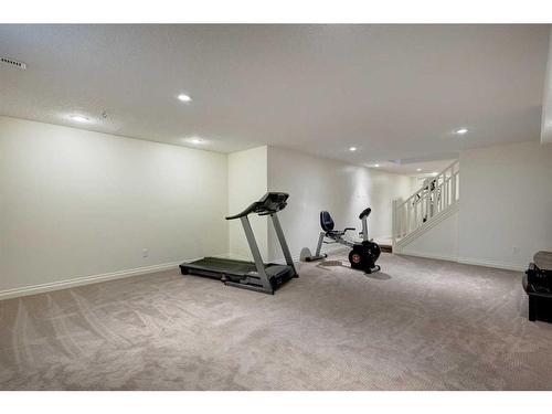 812 Lake Placid Drive Se, Calgary, AB - Indoor Photo Showing Gym Room